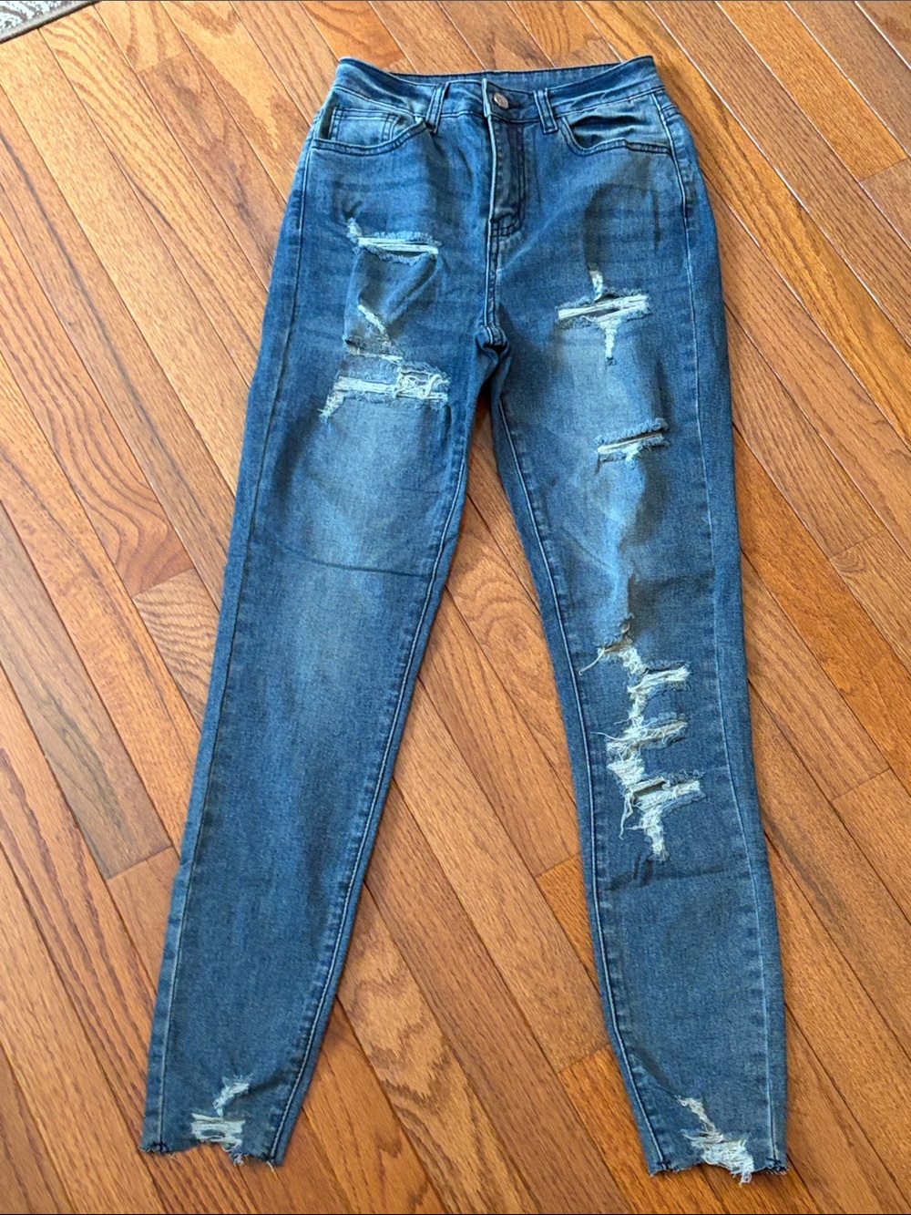 VIP Distressed Skinny Jeans in Washed Blue